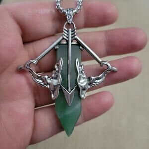 Green aventurine cross bow and arrow silver tone necklace, stainless steel chain